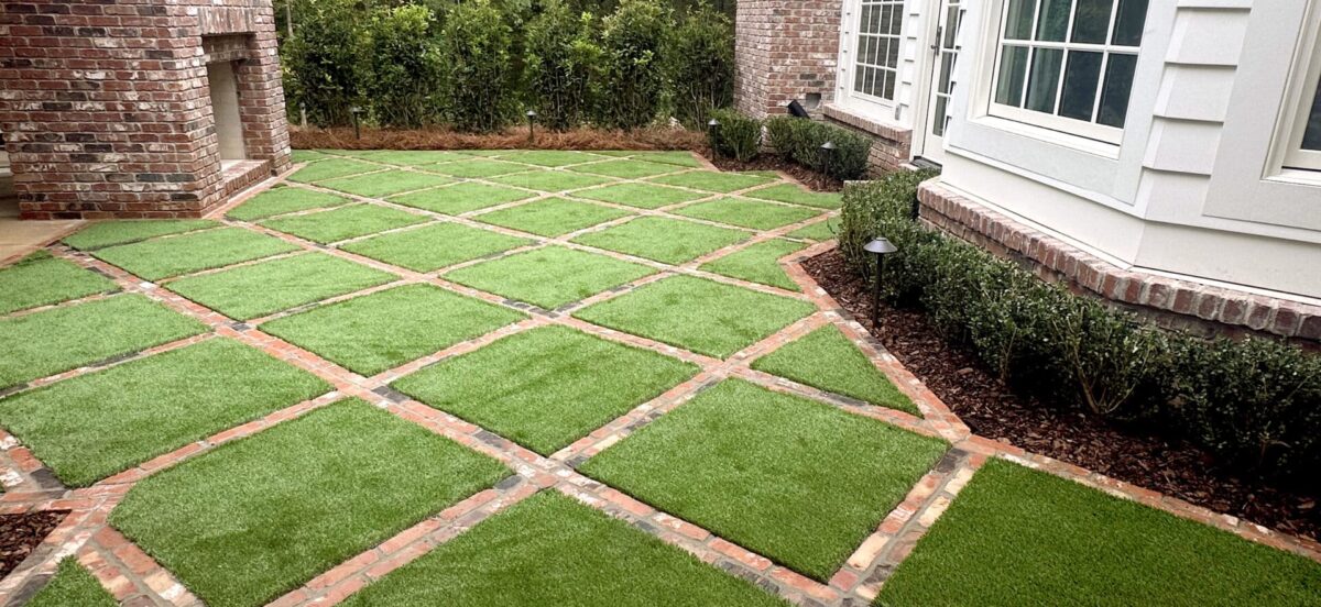 square patches of turf surrounded by brick outlines of each square patch